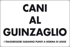 cartello CANI AL GUINZAGLIO I TRASGRESSORI SARANNO PUNITI A NORMA DI LEGGE